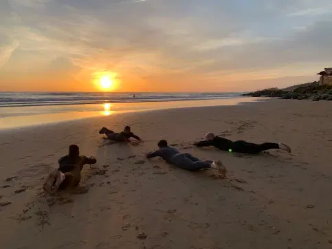 Surfing at sunset in Taghazout